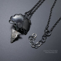 The moon on the ocean and Venus pendant, Black south sea pearl and a diamond oxi