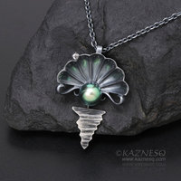 The moon on the ocean and Venus pendant, Black south sea pearl and a diamond oxi