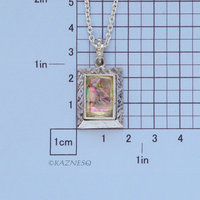 Alluring iridescence! : Rutilated Quartz with Paua Shell Rectangle Silver Pendant