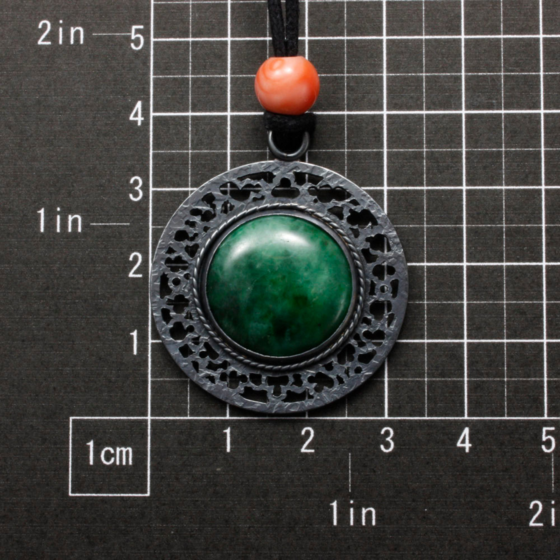 (C) KAZNESQ: Jadeite round oriental open work pendant