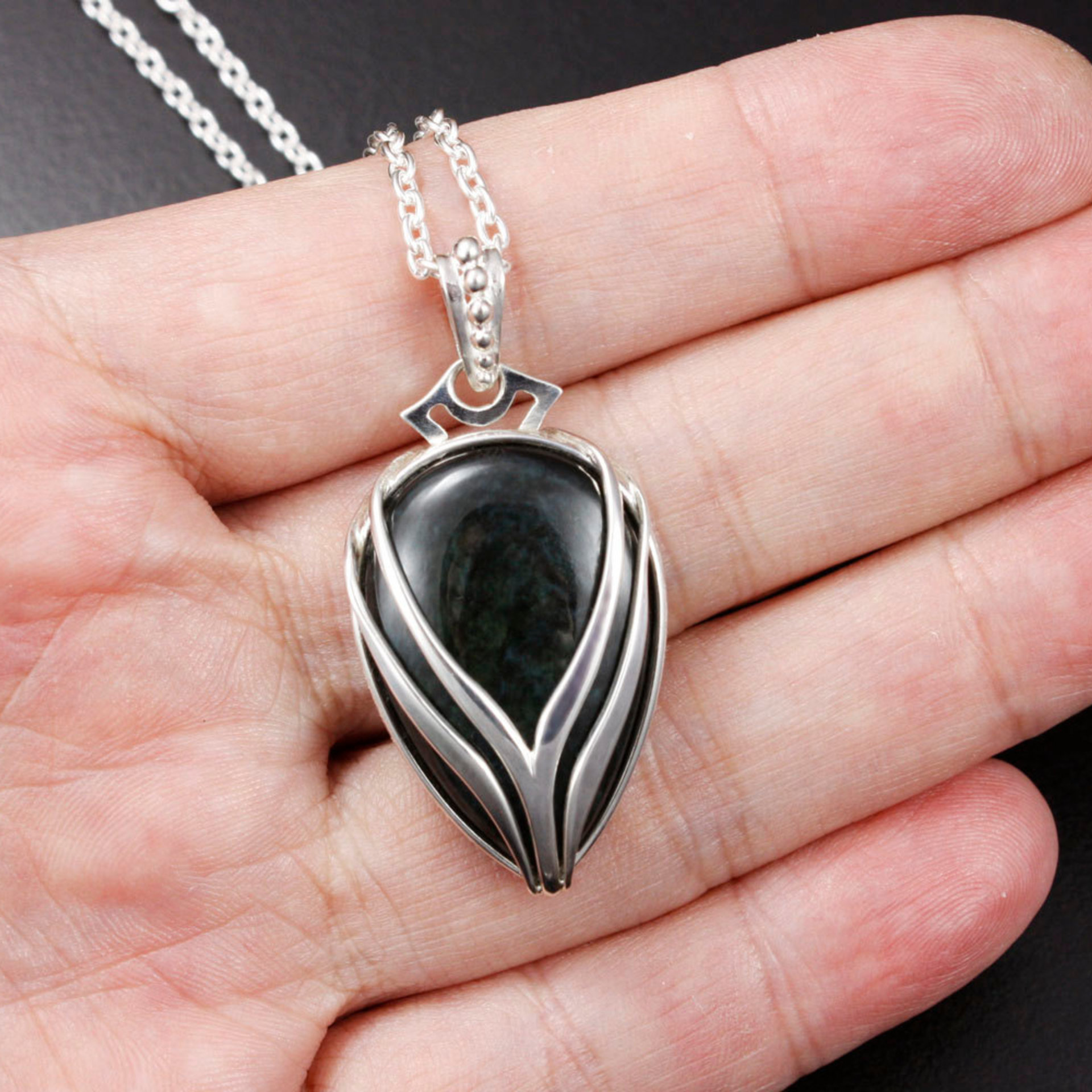 SOLD: Velvet obsidian silver pendant with stream lines