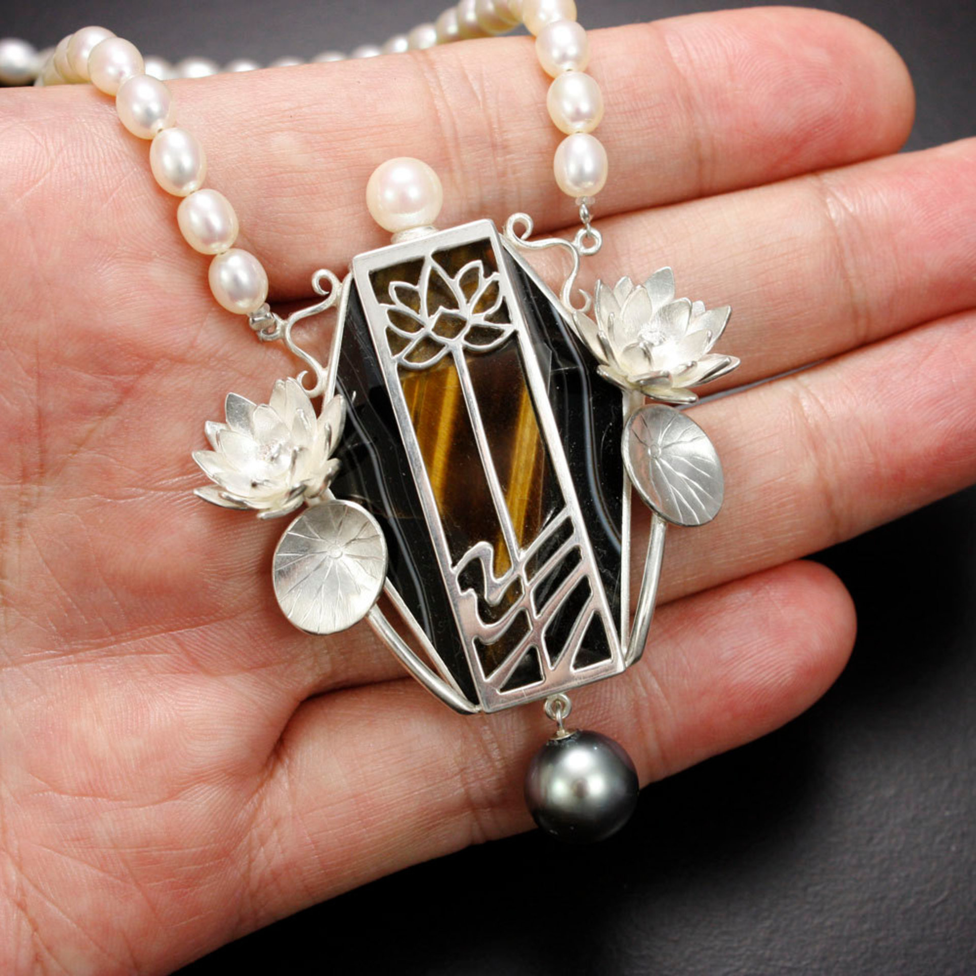 Lotus open work tiger's eye necklace