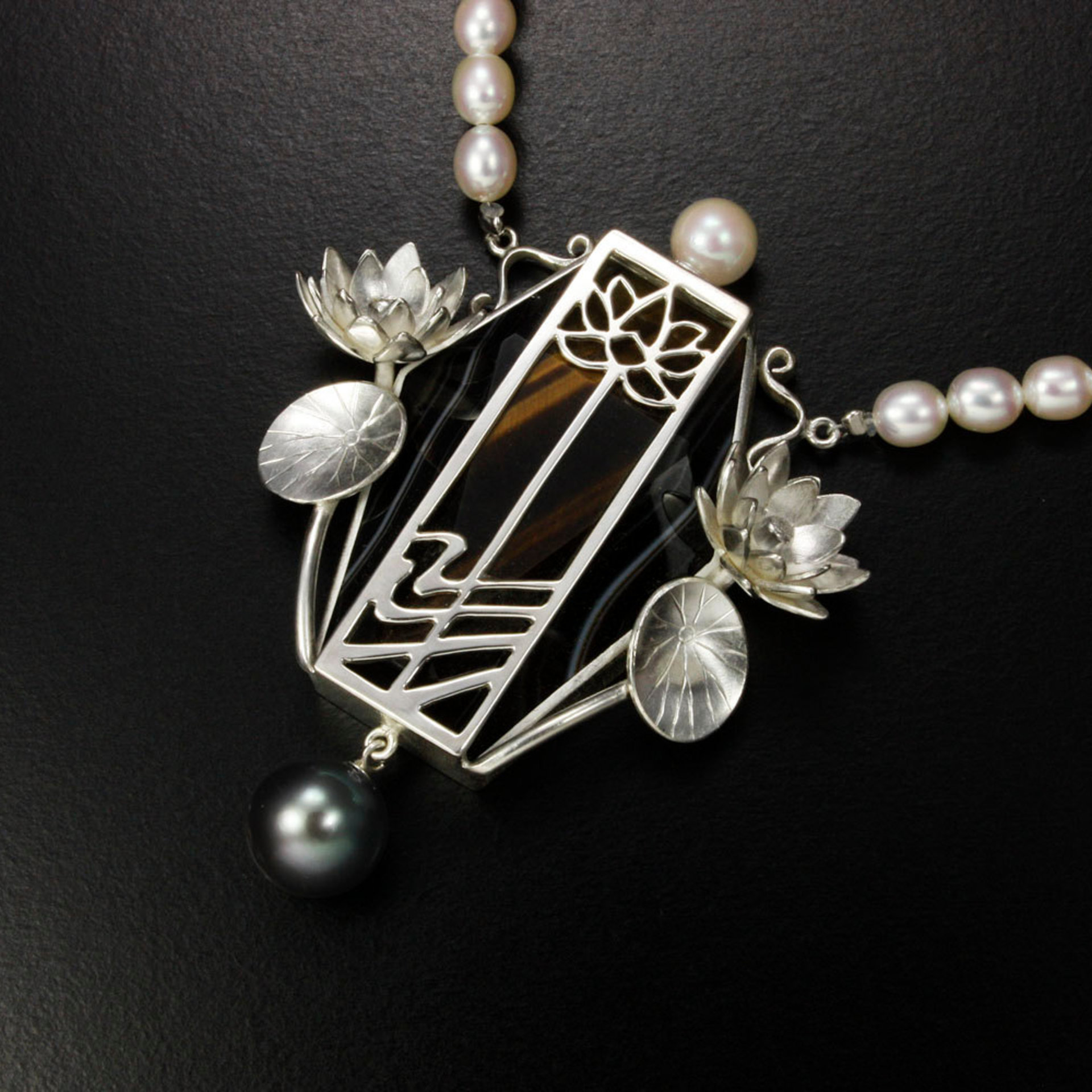 Lotus open work tiger's eye necklace