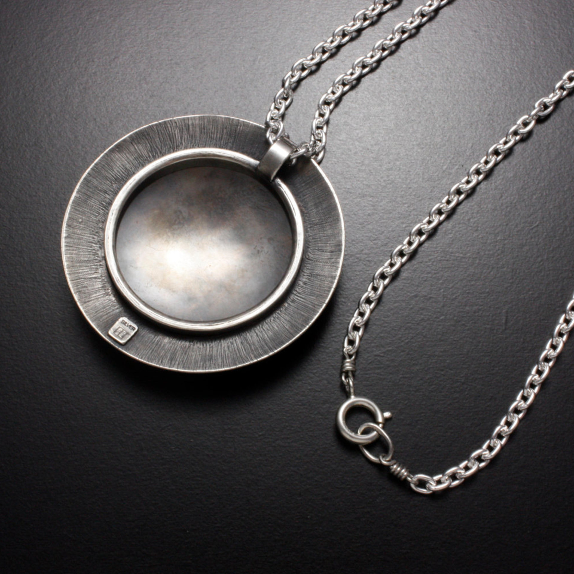 SOLD: Round Keum Boo silver pendant of white blossoms motif