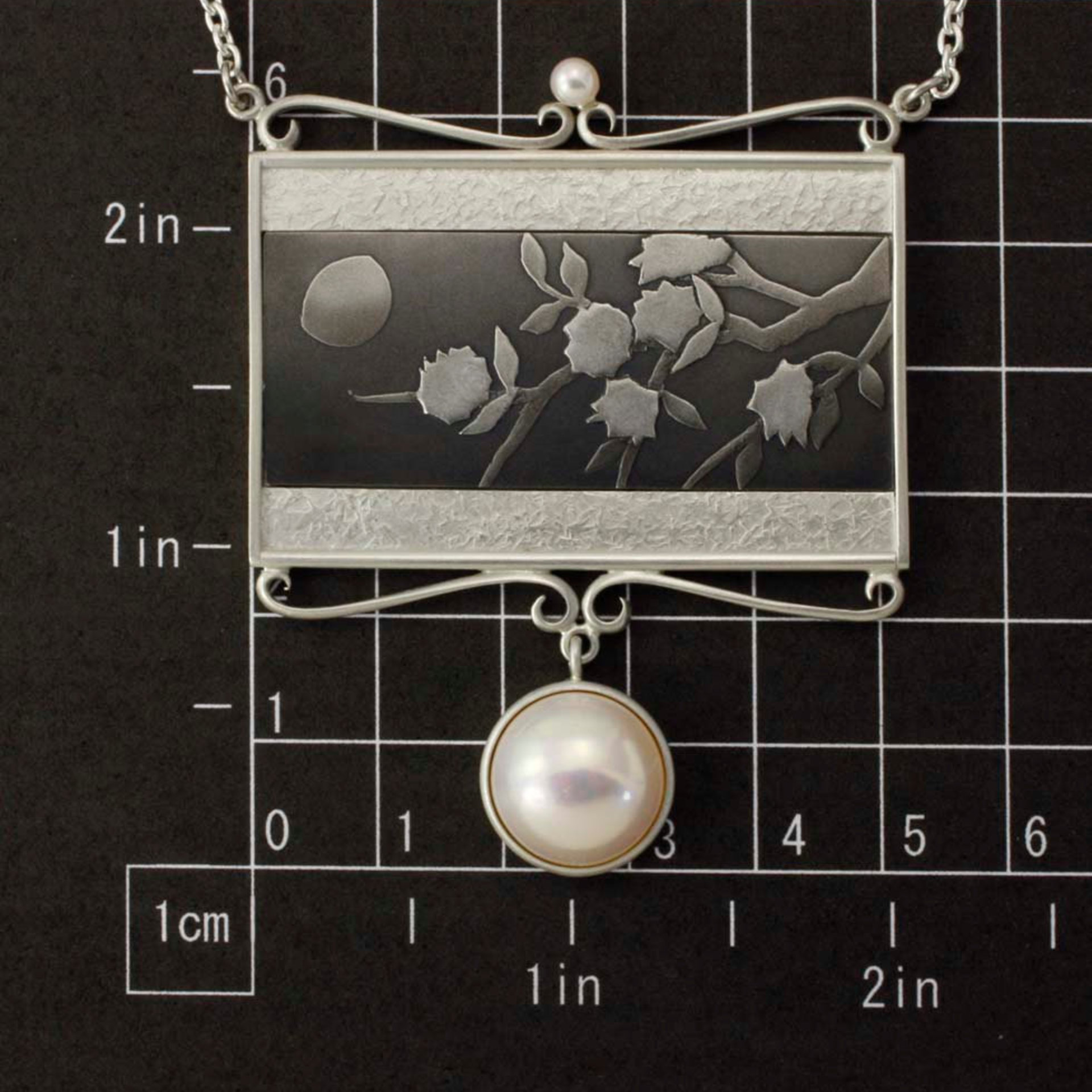 SOLD: Keum Boo silver necklace of the moon and blossoms motif