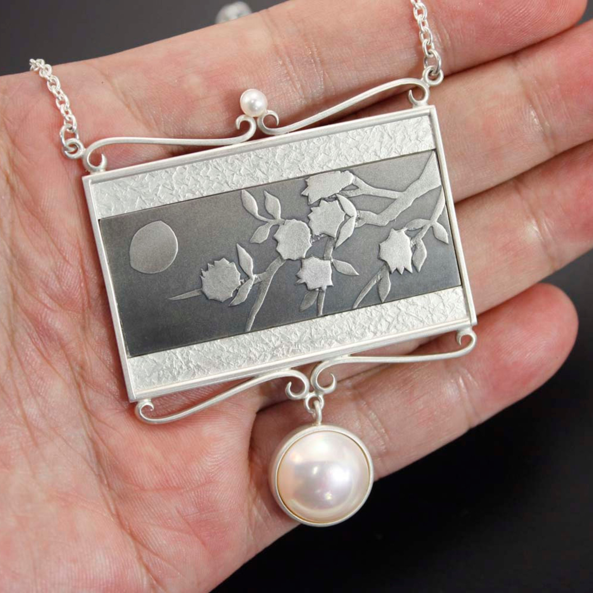 SOLD: Keum Boo silver necklace of the moon and blossoms motif