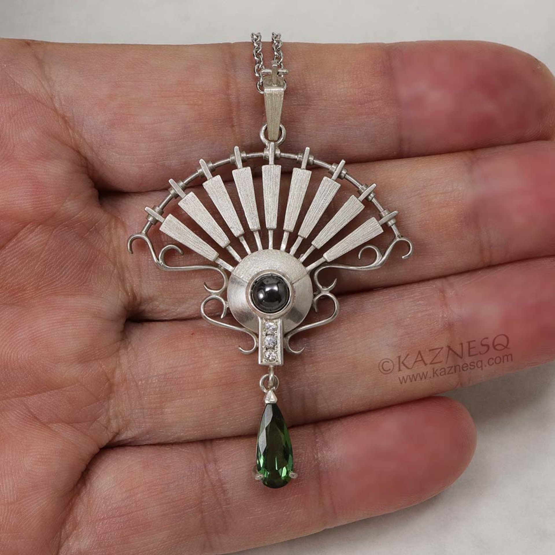 On Sale: Green tourmaline, hematite, fan motif silver pendant