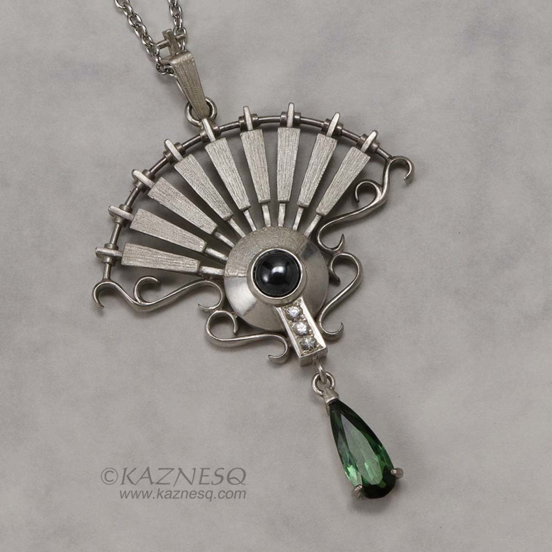 On Sale: Green tourmaline, hematite, fan motif silver pendant