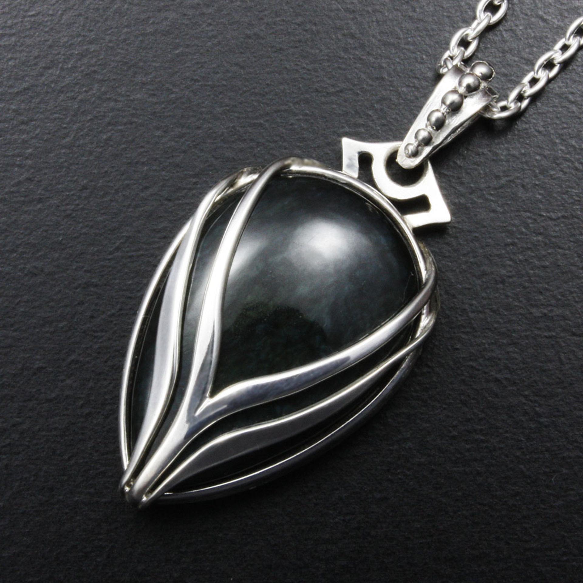 SOLD: Velvet obsidian silver pendant with stream lines