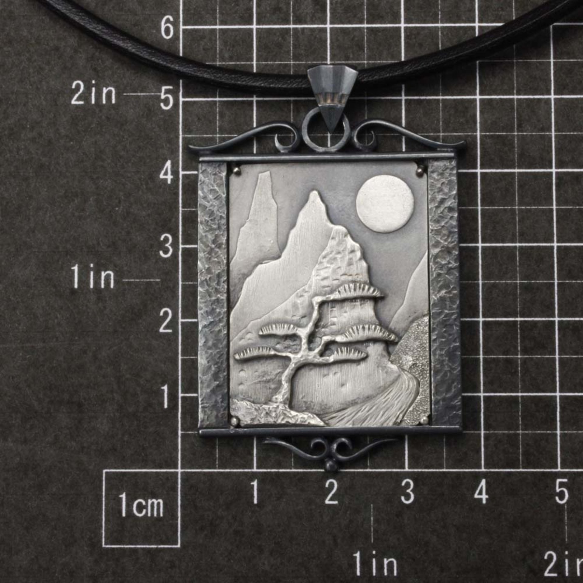 SOLD: The moon and a pine tree silver pendant