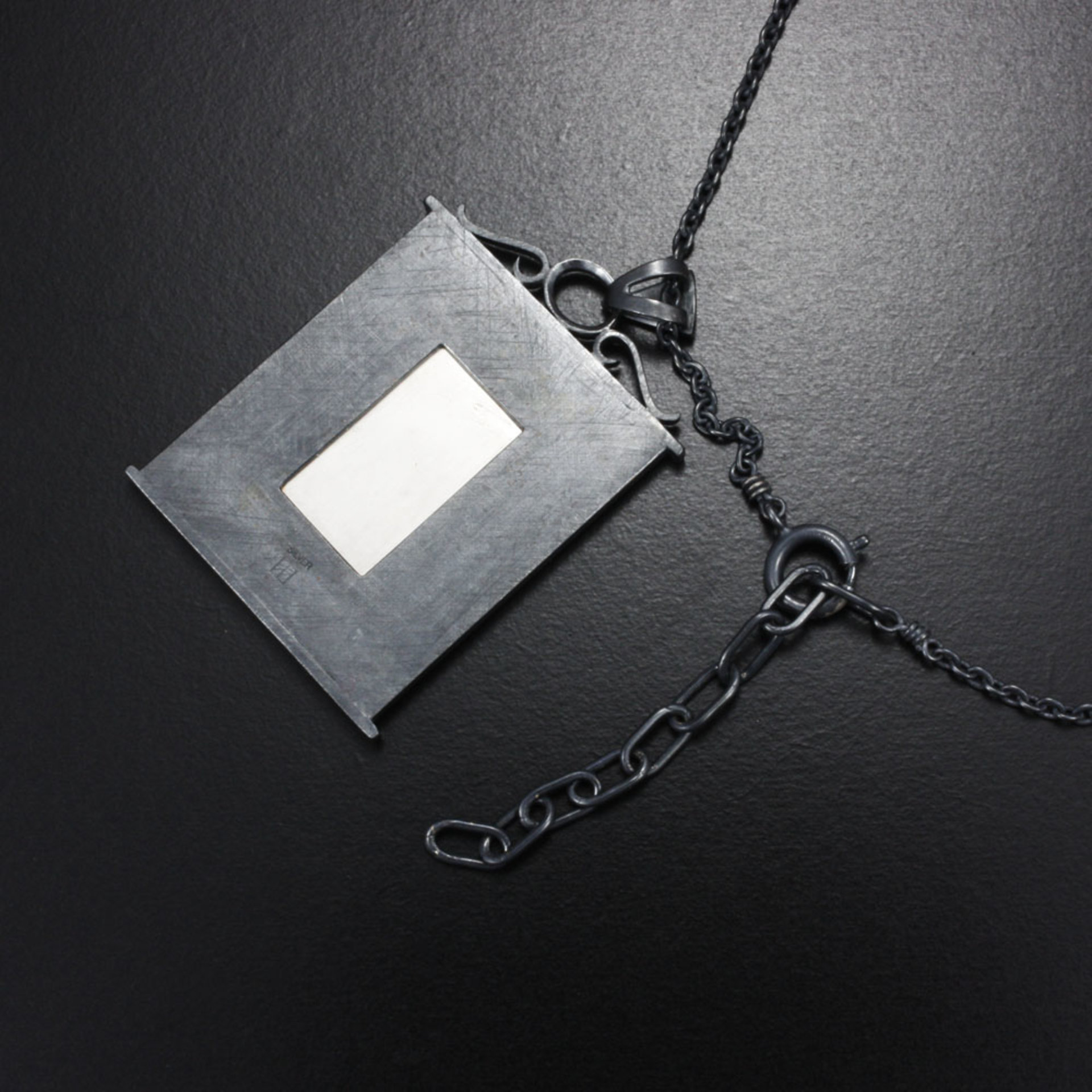 Sold: Pine tree on a cliff silver pendant