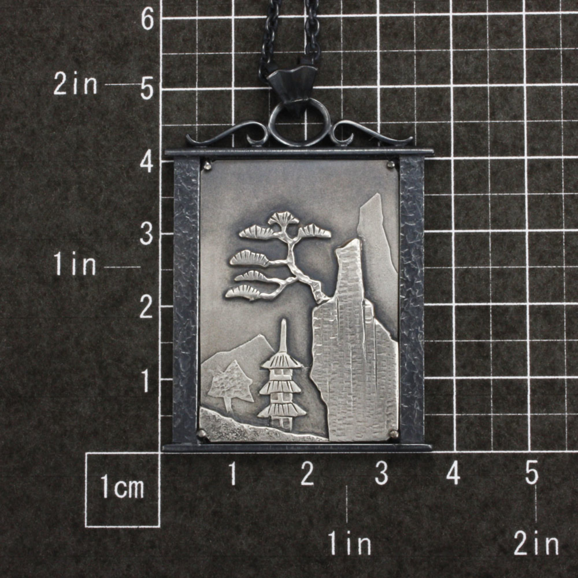 Sold: Pine tree on a cliff silver pendant