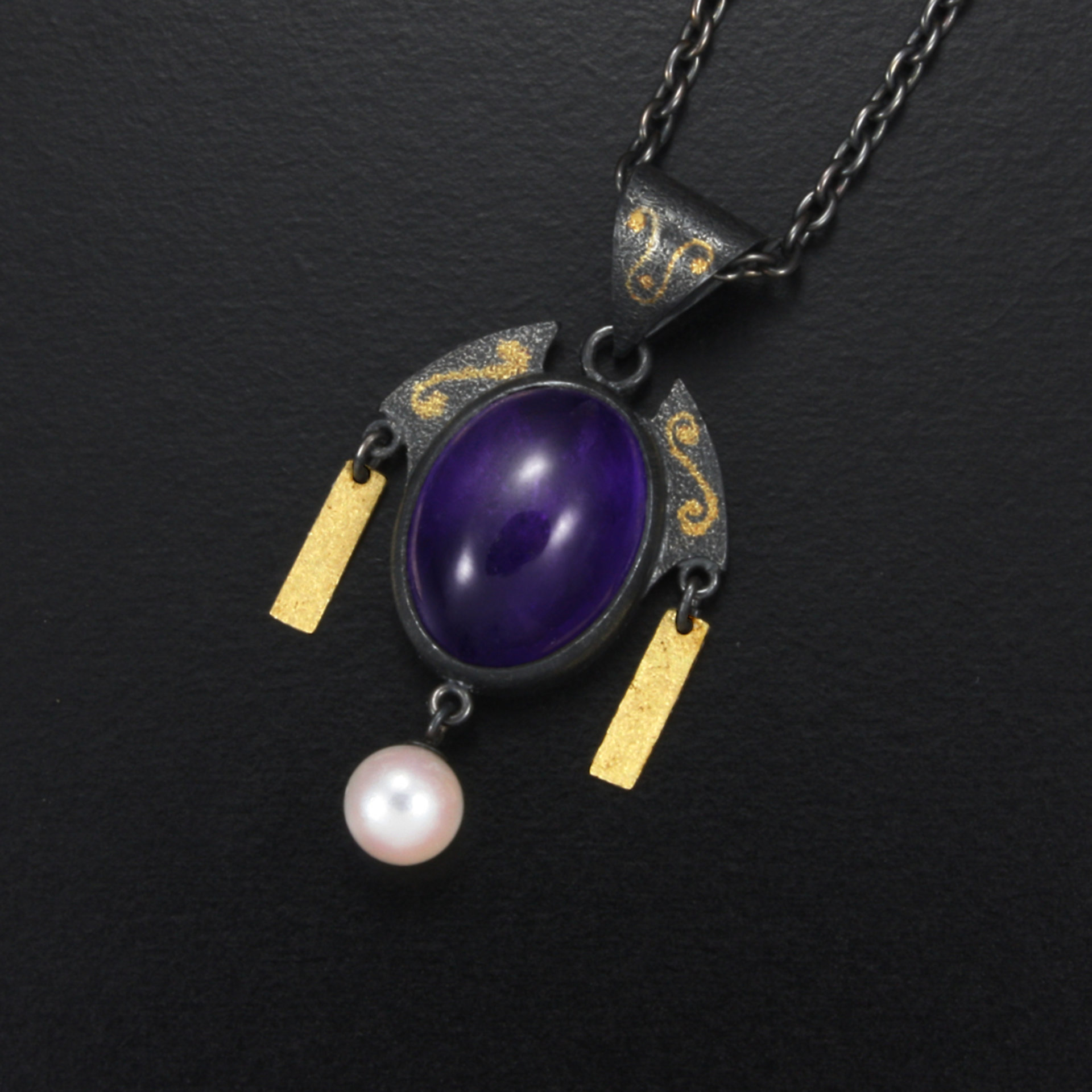 Amethyst cab and gold inlay silver pendant