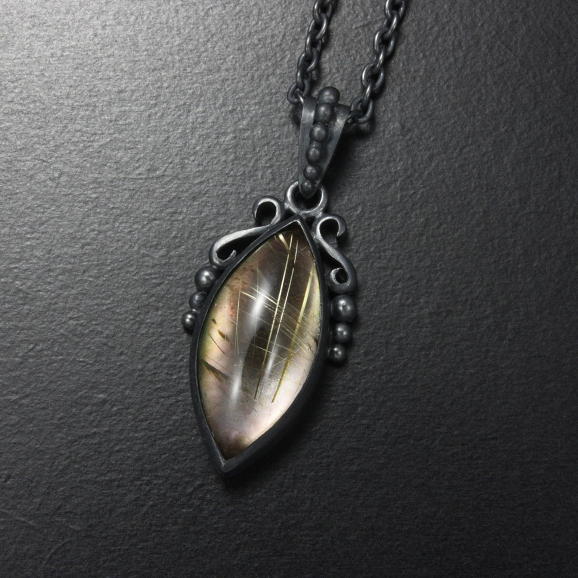 Rutilated quartz pendant, oxidized silver pendant necklace, black mother of pear