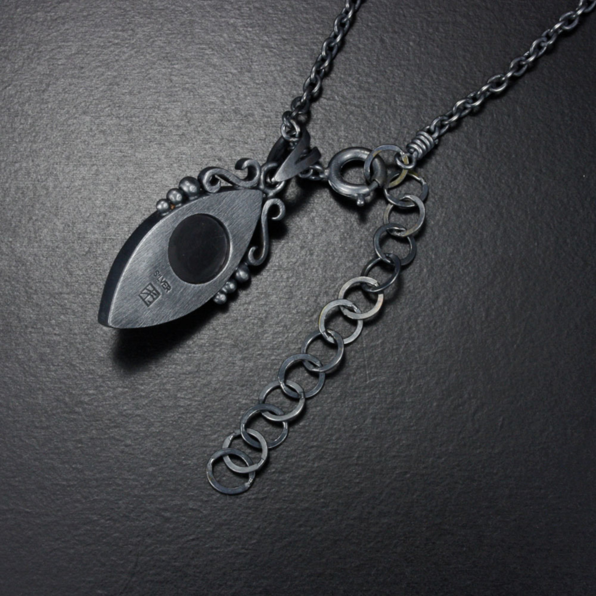 SOLD: Rutilated quartz pendant, oxidized silver pendant necklace, black mother of pearl lined quartz