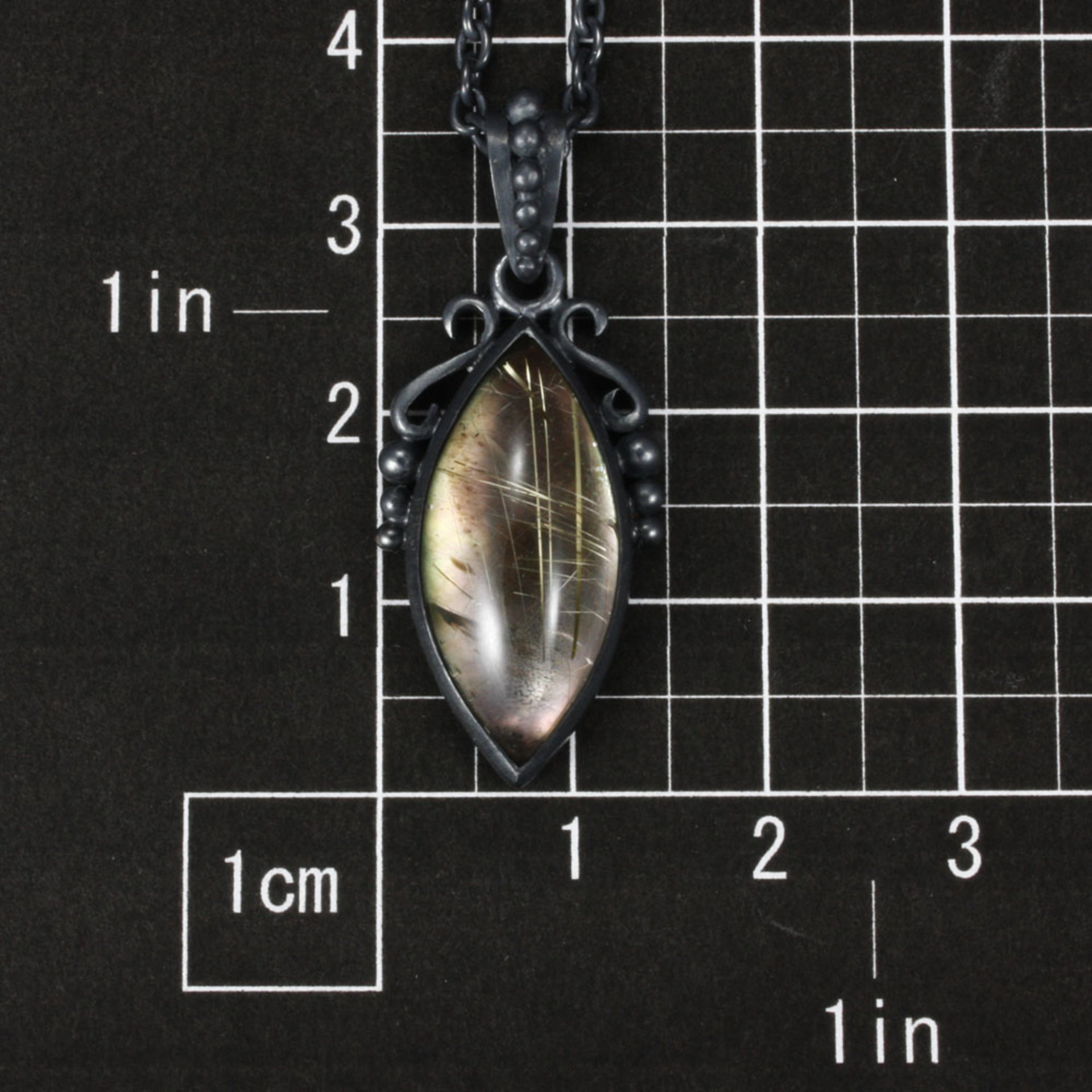 SOLD: Rutilated quartz pendant, oxidized silver pendant necklace, black mother of pearl lined quartz