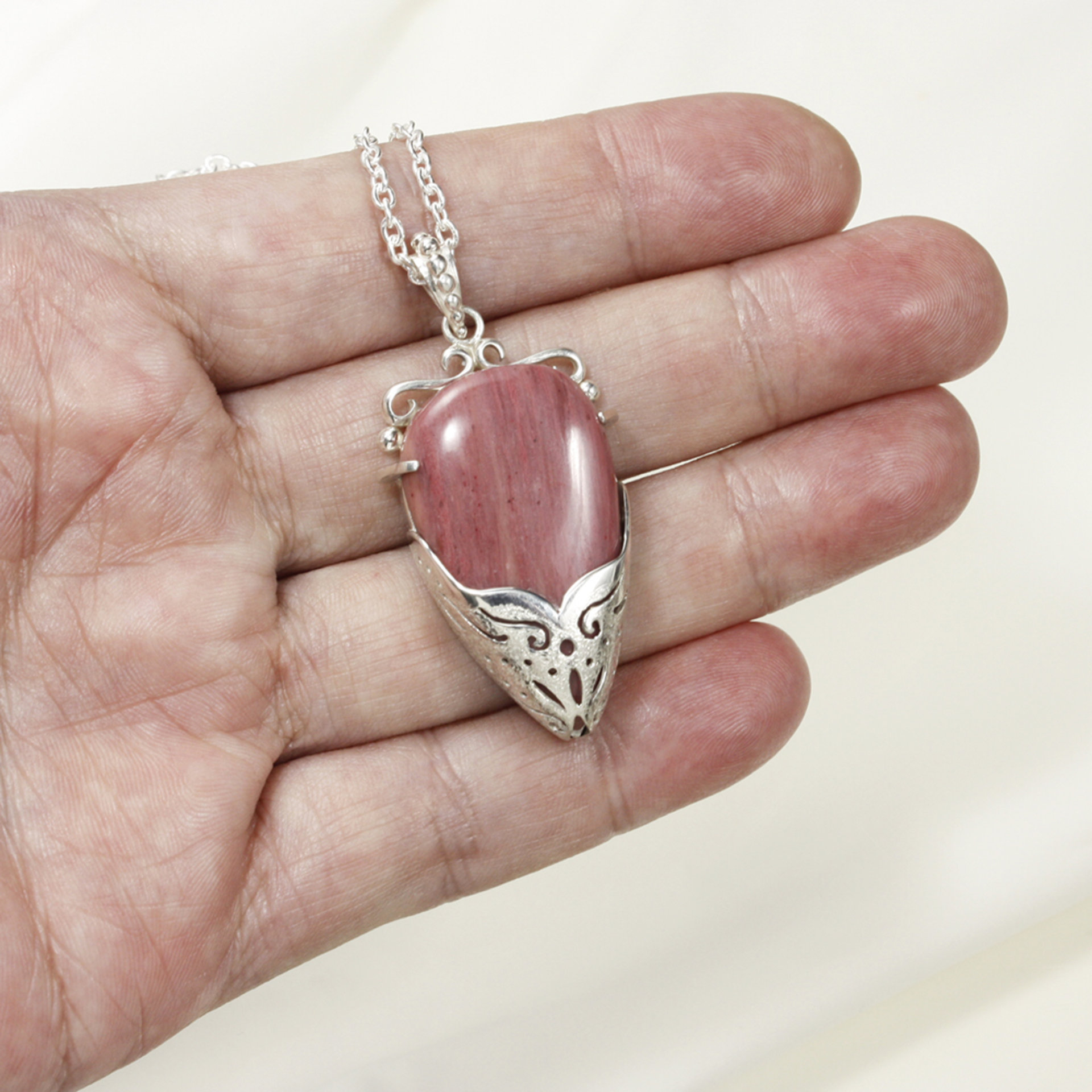 Sold: Pink stone pendant necklace, silver pendant necklace, openwork pendant necklace