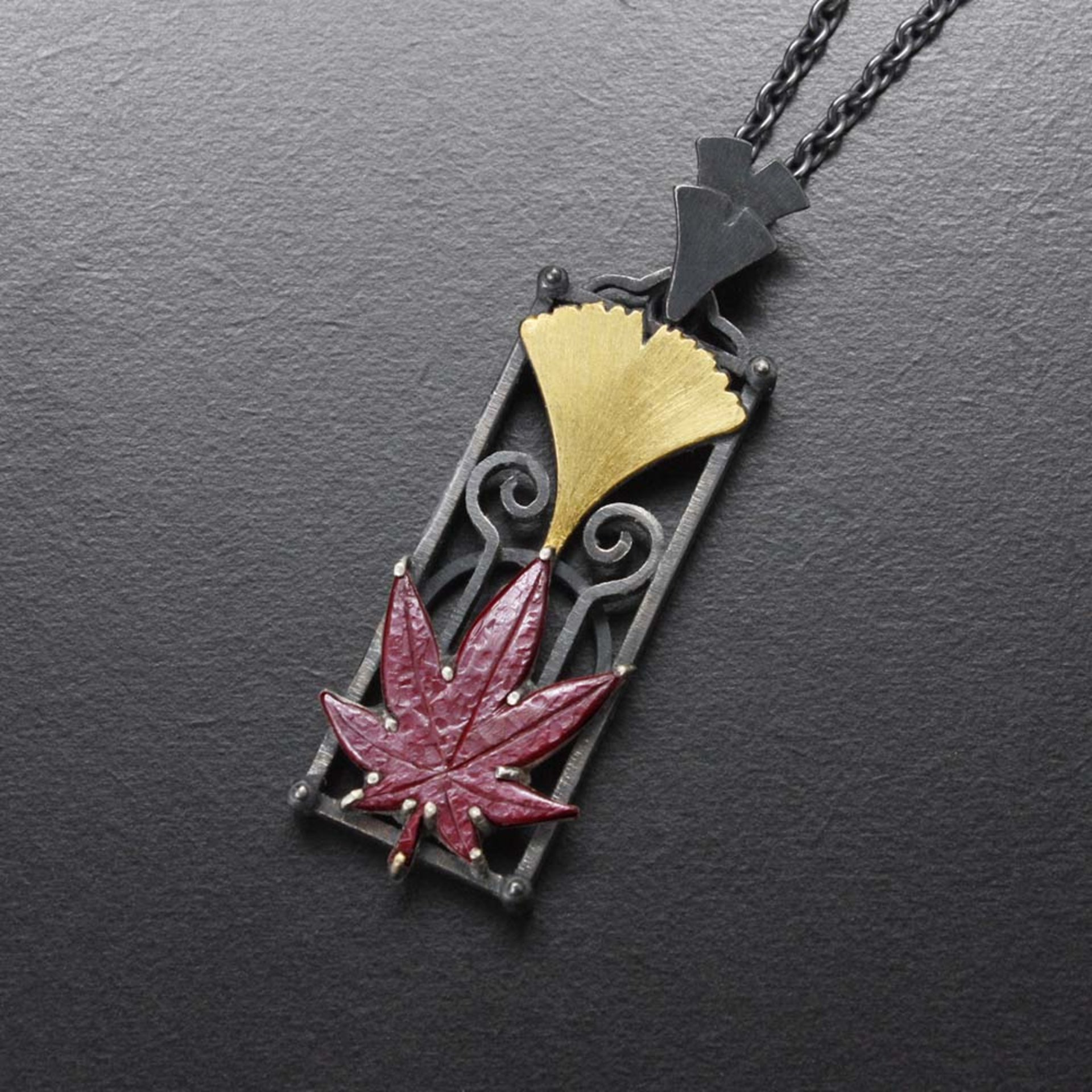 Ginkgo and maple leaf pendant necklace in Art Deco style
