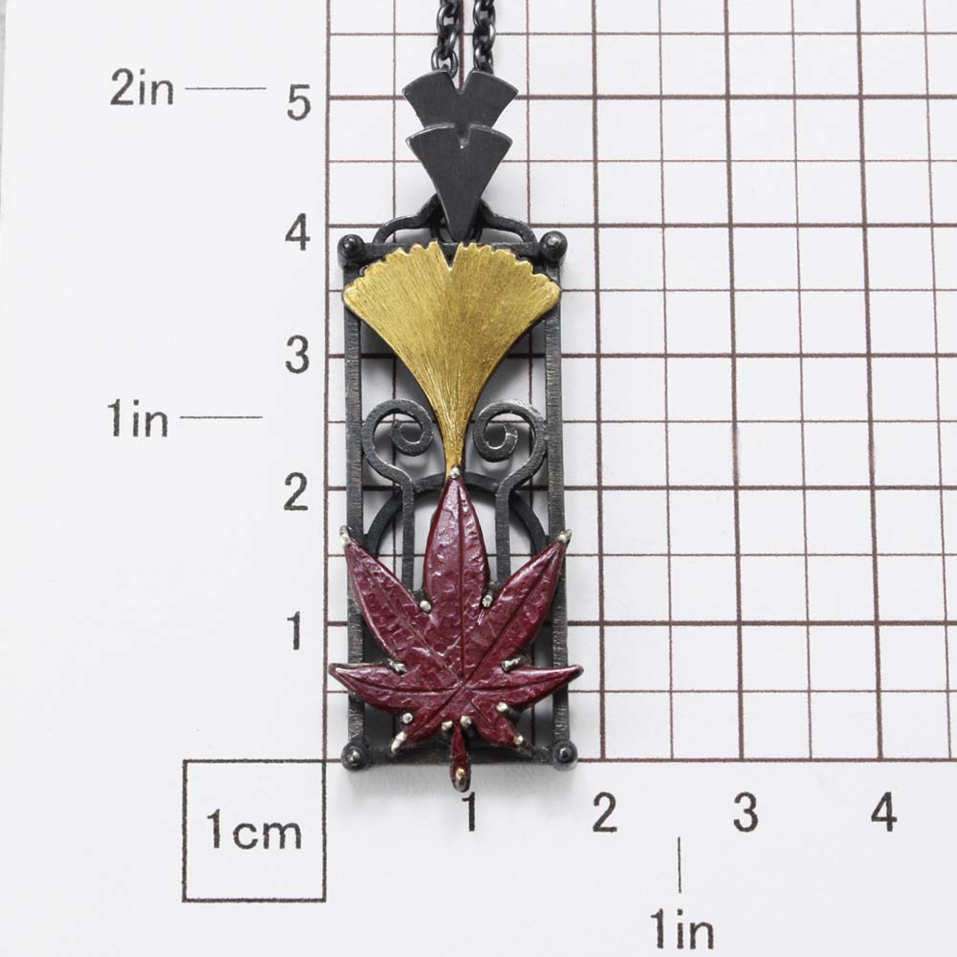 Ginkgo and maple leaf pendant necklace in Art Deco style