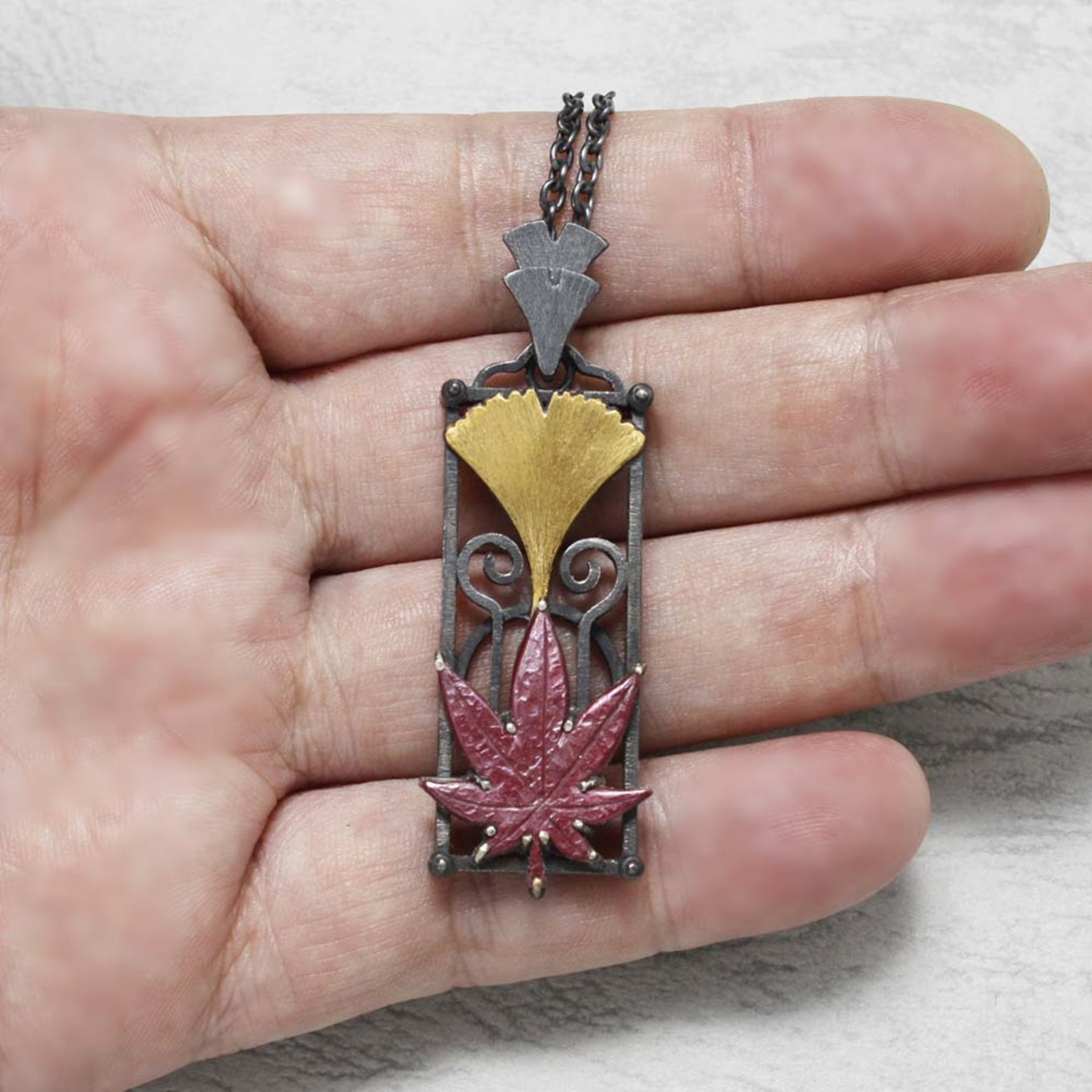 Ginkgo and maple leaf pendant necklace in Art Deco style