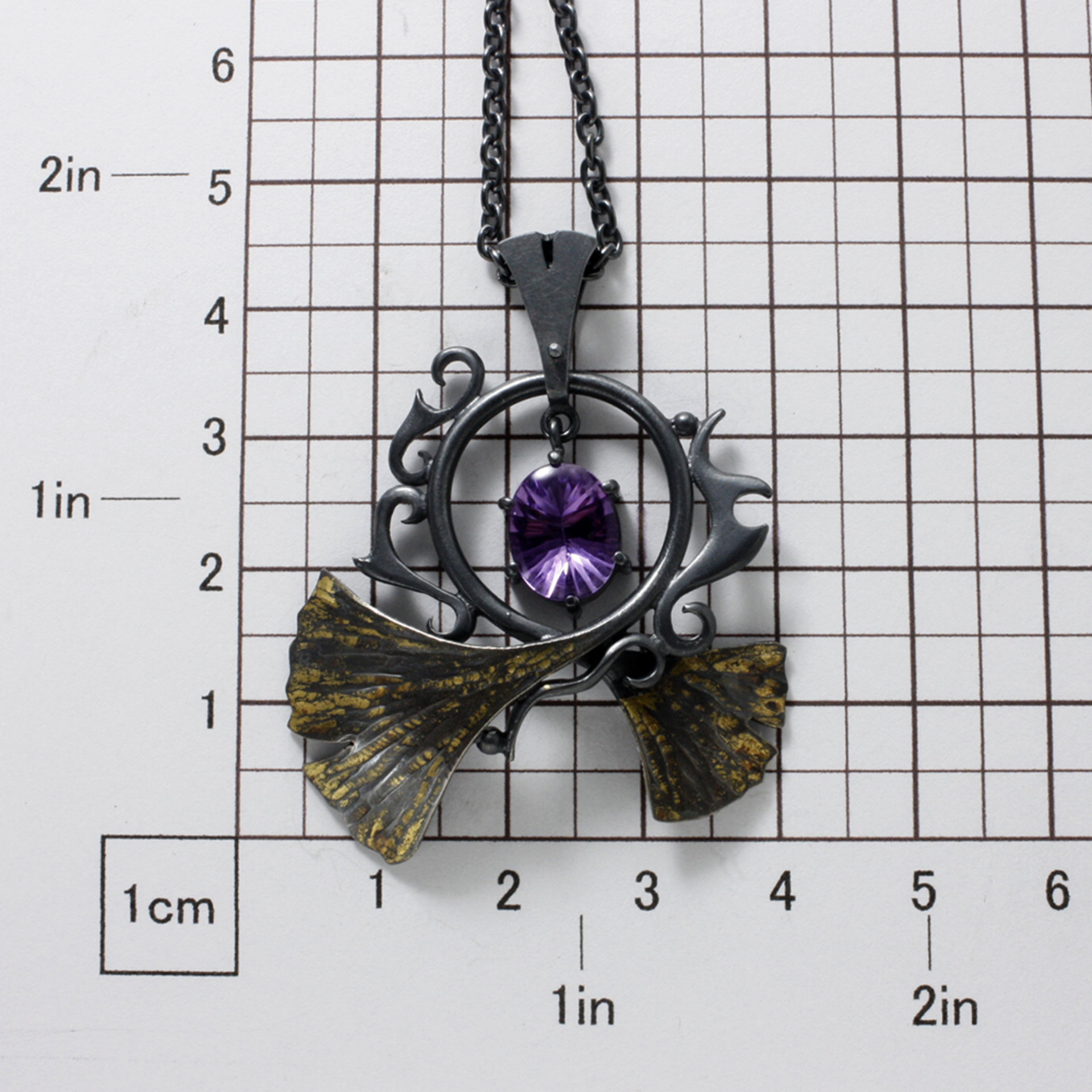 Oxidized silver ginkgo pendant necklace with amethyst and worn out gold leaf