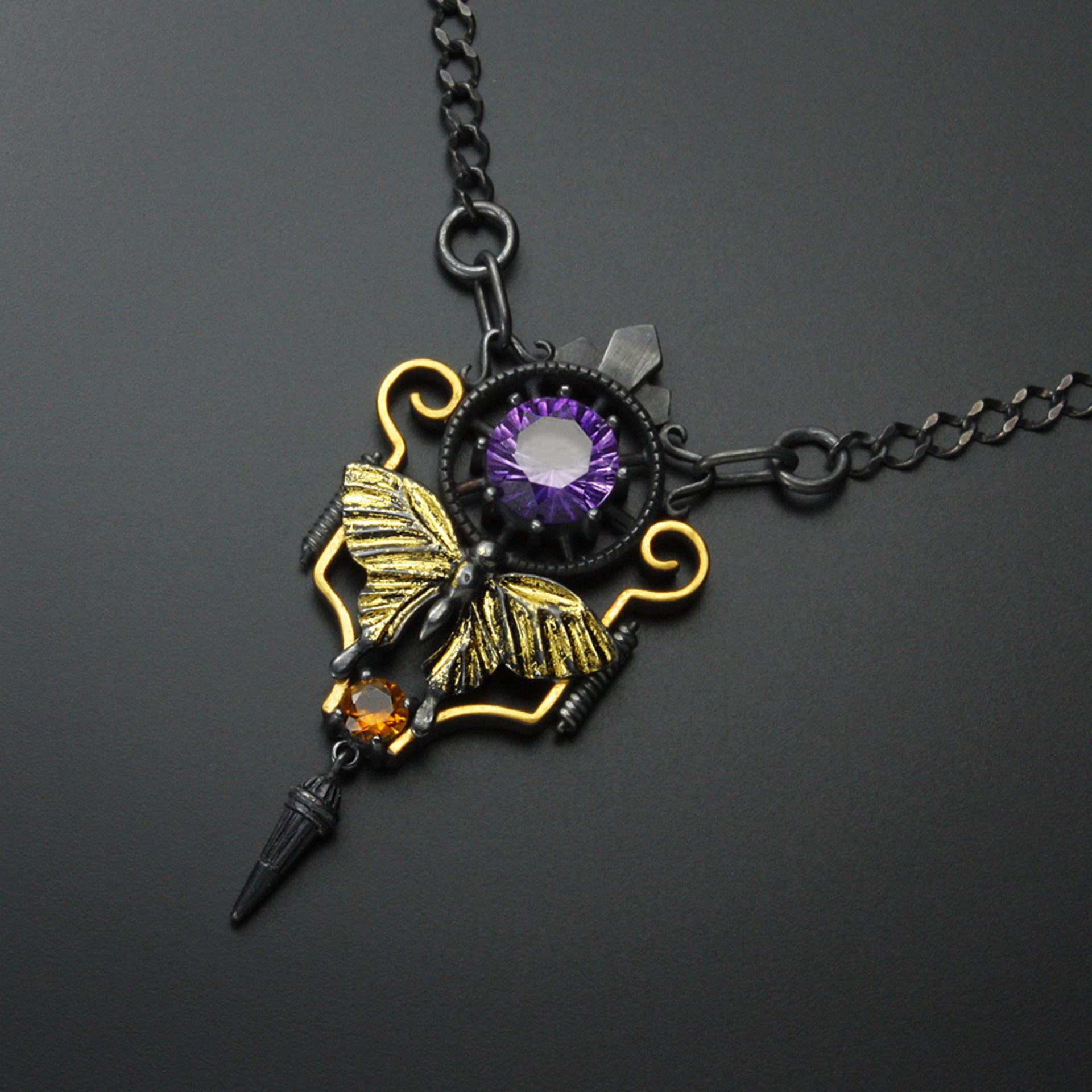 Art deco style necklace with a round amethyst and Keum Boo scrolls