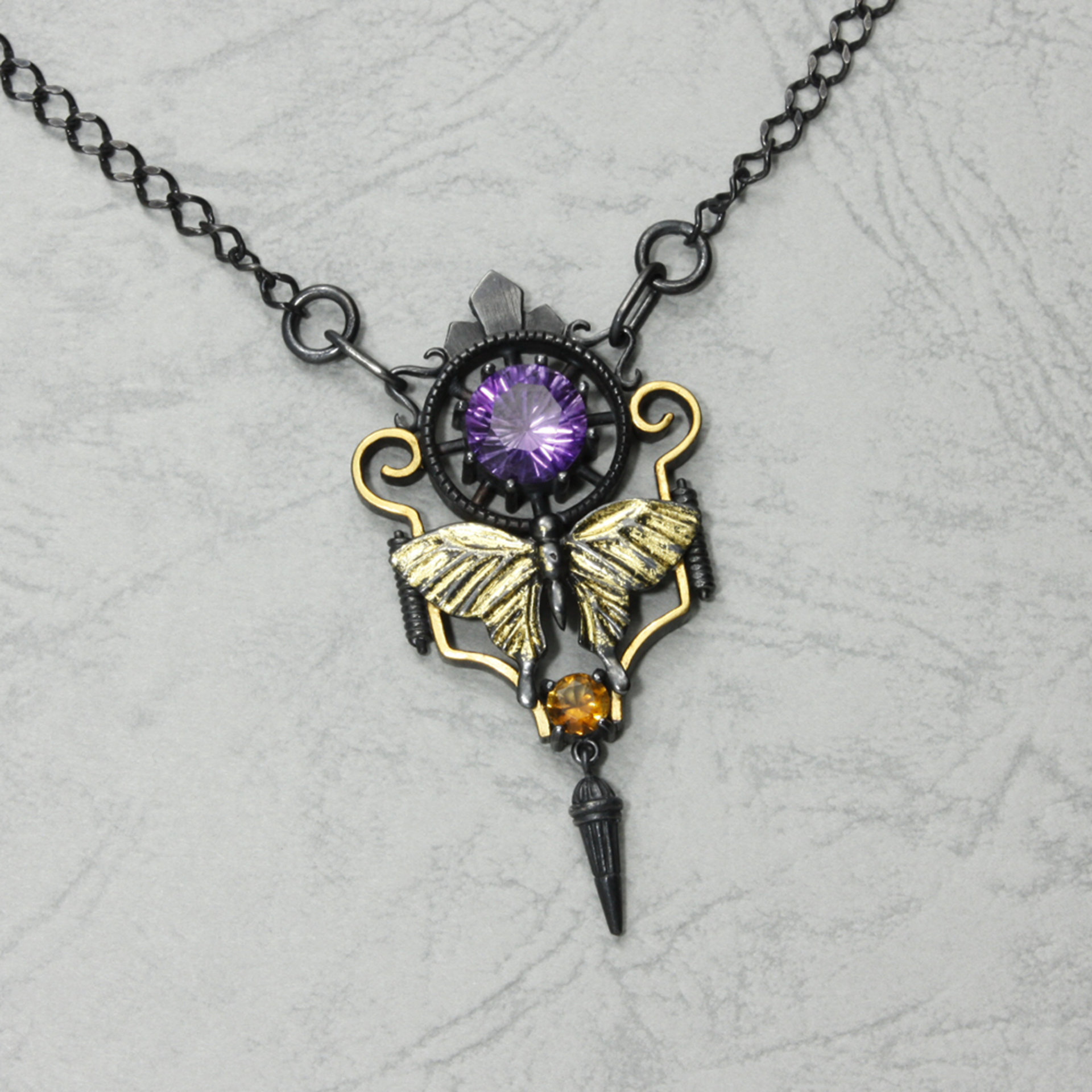 Art deco style necklace with a round amethyst and Keum Boo scrolls