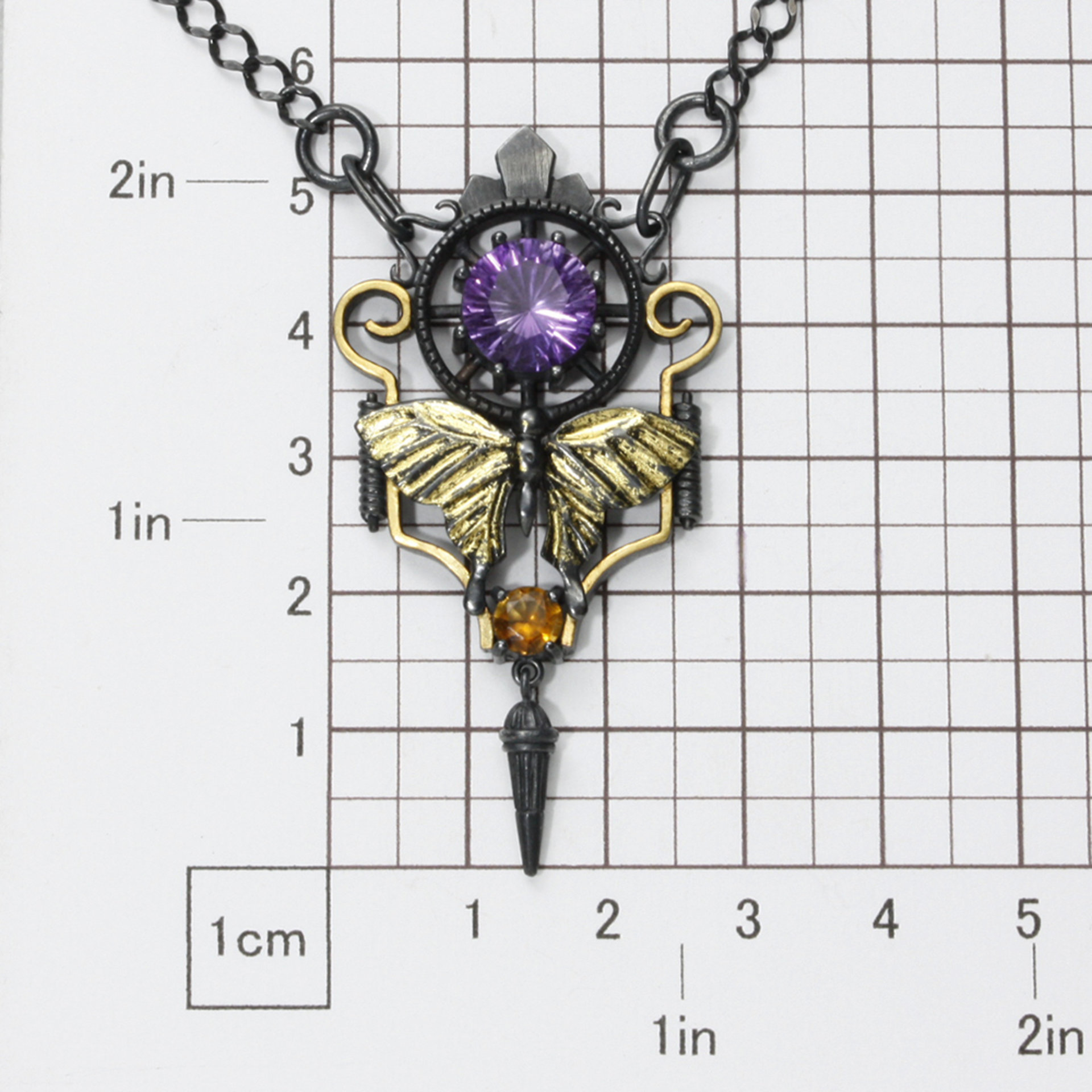 Art deco style necklace with a round amethyst and Keum Boo scrolls