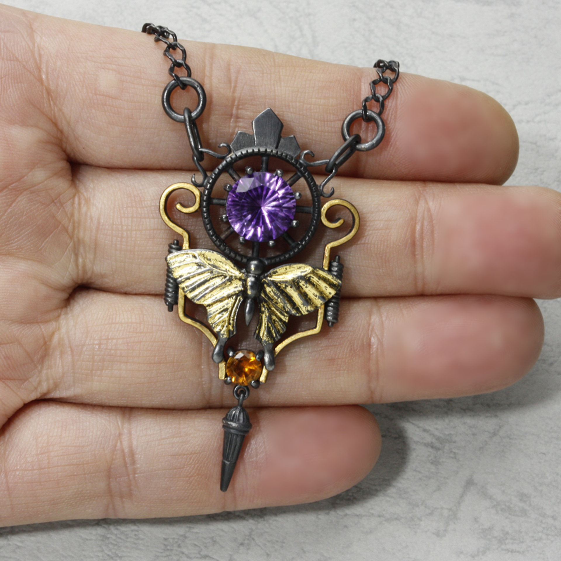 Art deco style necklace with a round amethyst and Keum Boo scrolls