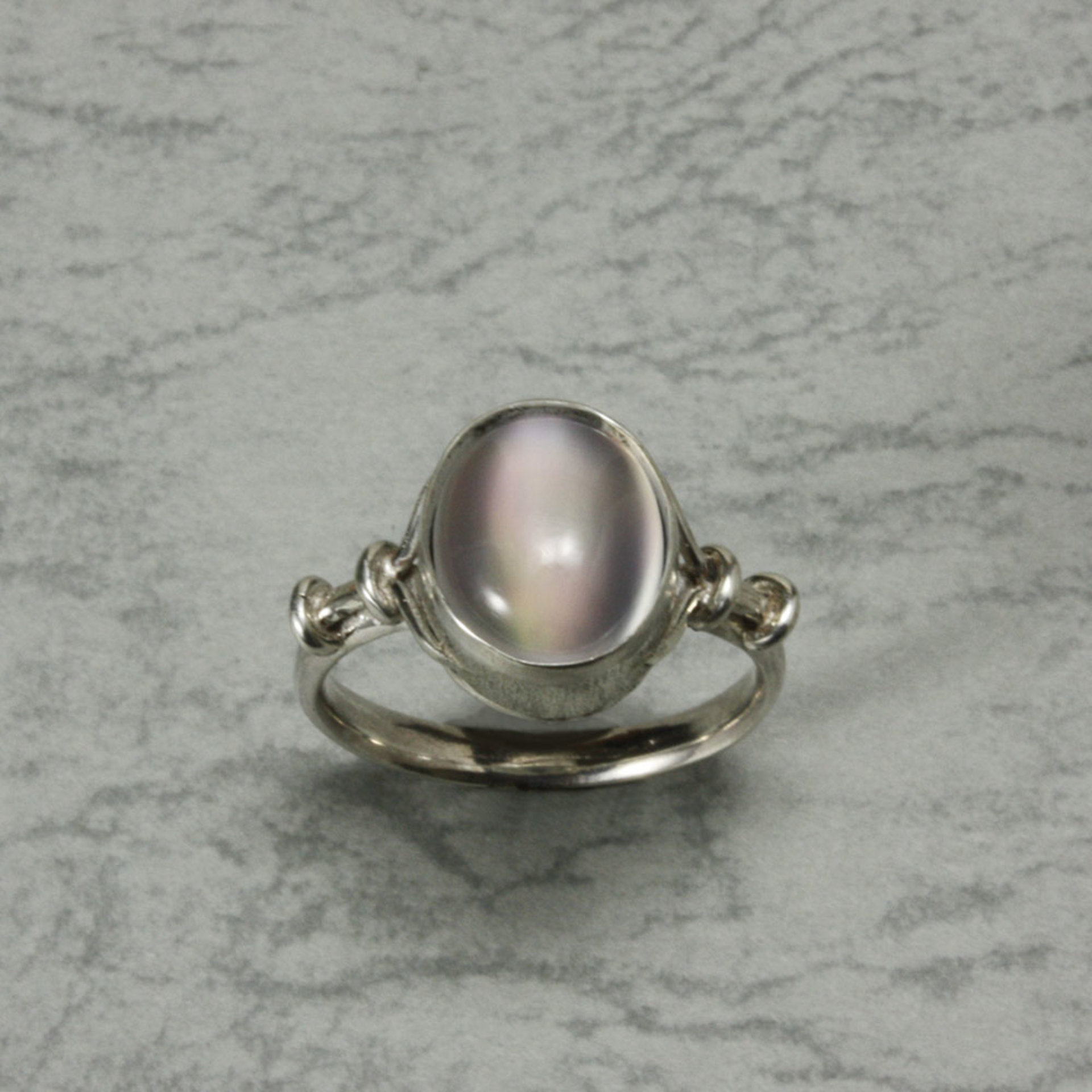 Oval rainbow color cats eye Moonstone silver ring.