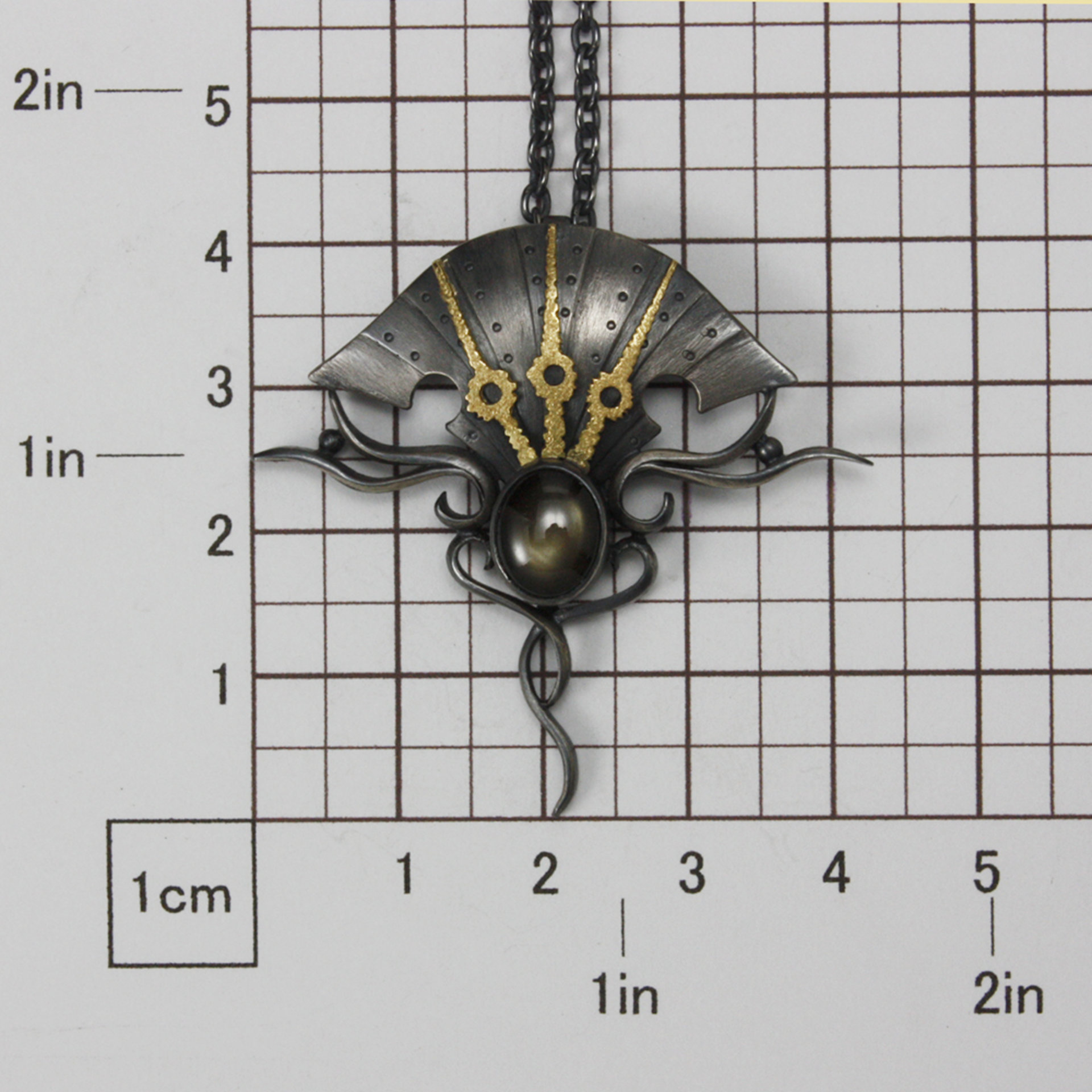 Black star sapphire steampunk silver and gold necklace