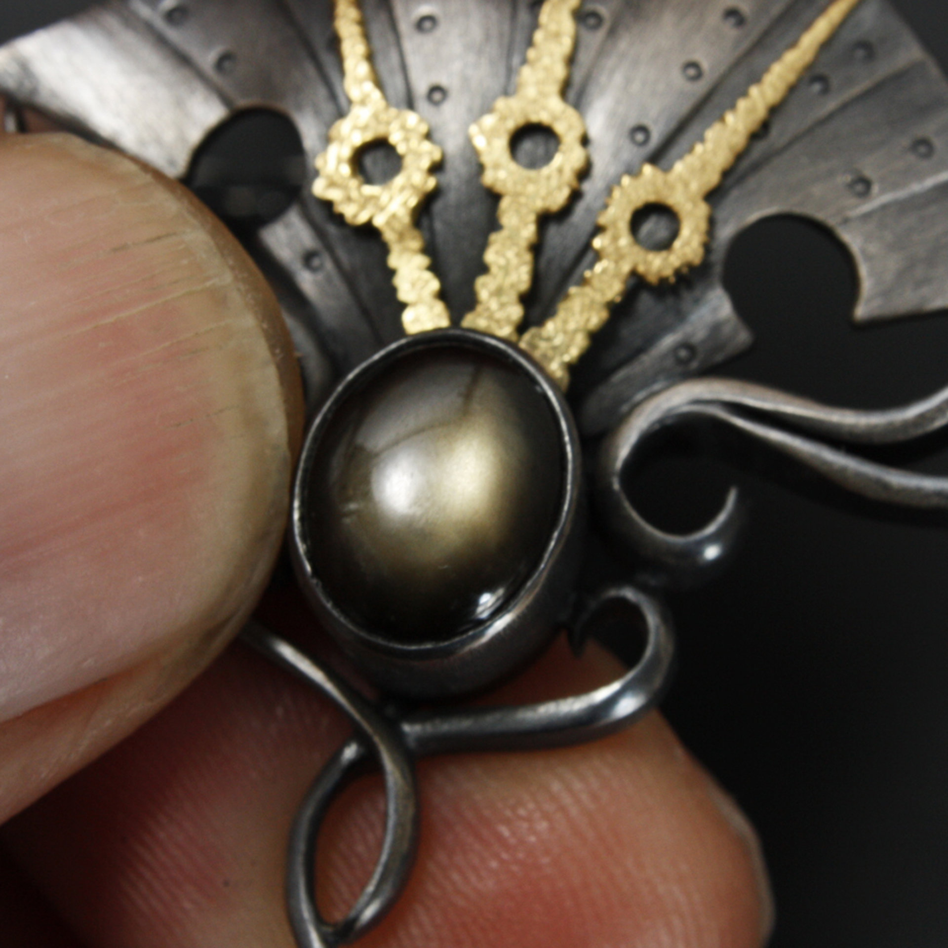 Black star sapphire steampunk silver and gold necklace
