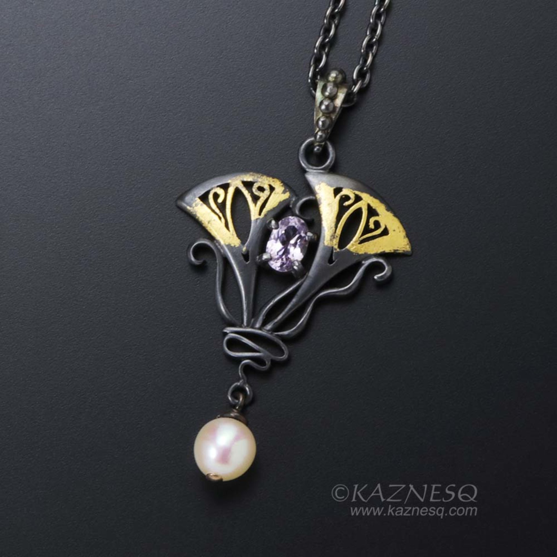 Lavender spinel Art Nouveau style oxidized silver pendant with a freshwater pear