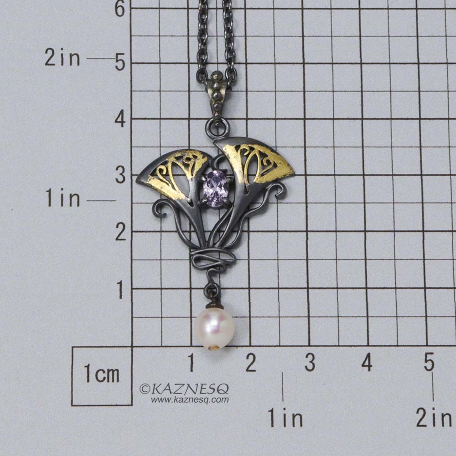 Lavender spinel Art Nouveau style oxidized silver pendant with a freshwater pear