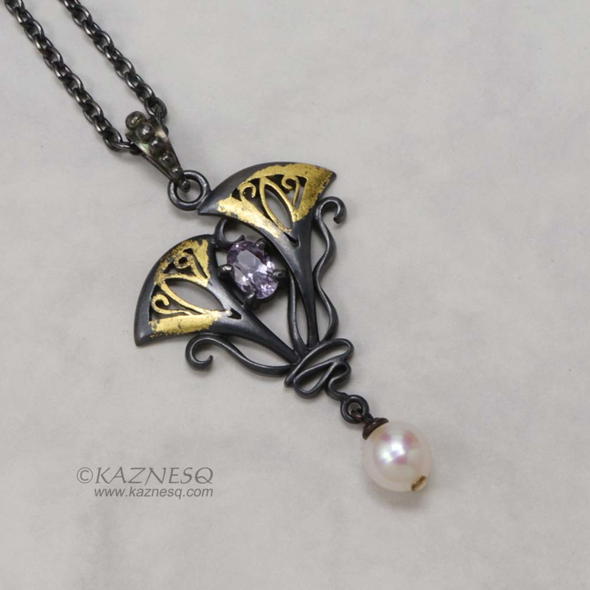 Lavender spinel Art Nouveau style oxidized silver pendant with a freshwater pear