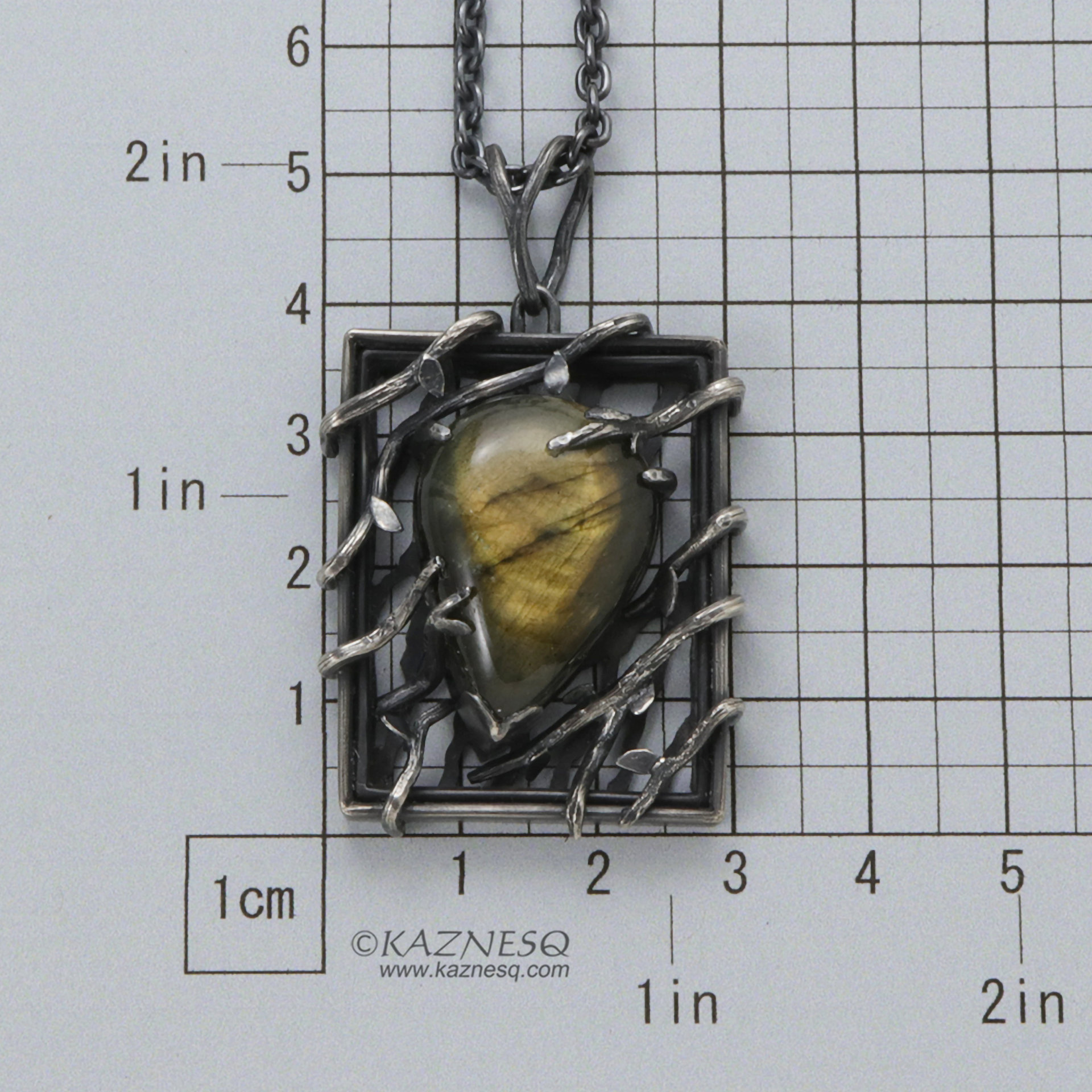 (C) KAZNESQ: Yellow labradorite trapped in a bush goth oxidized silver pendant