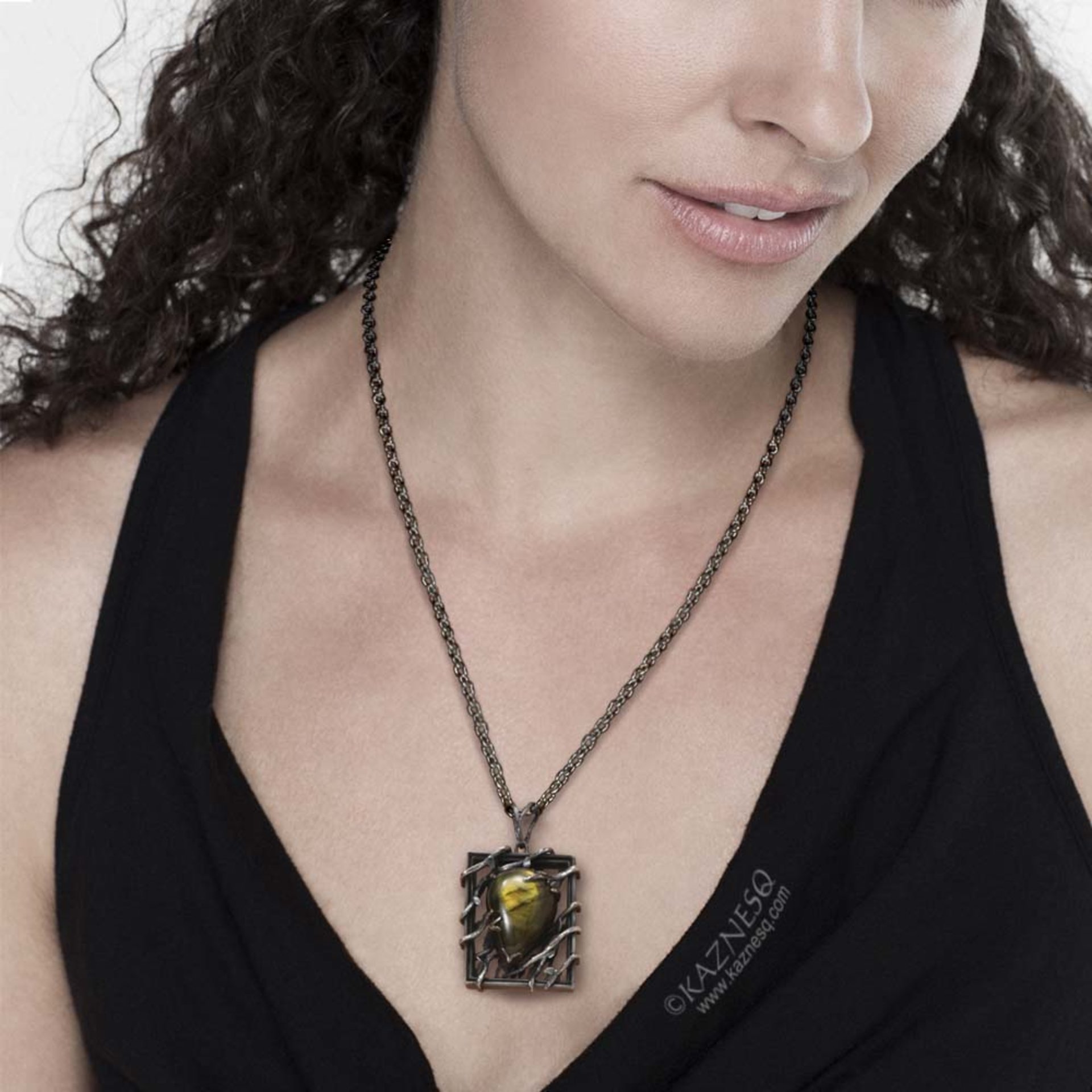 (C) KAZNESQ: Yellow labradorite trapped in a bush goth oxidized silver pendant