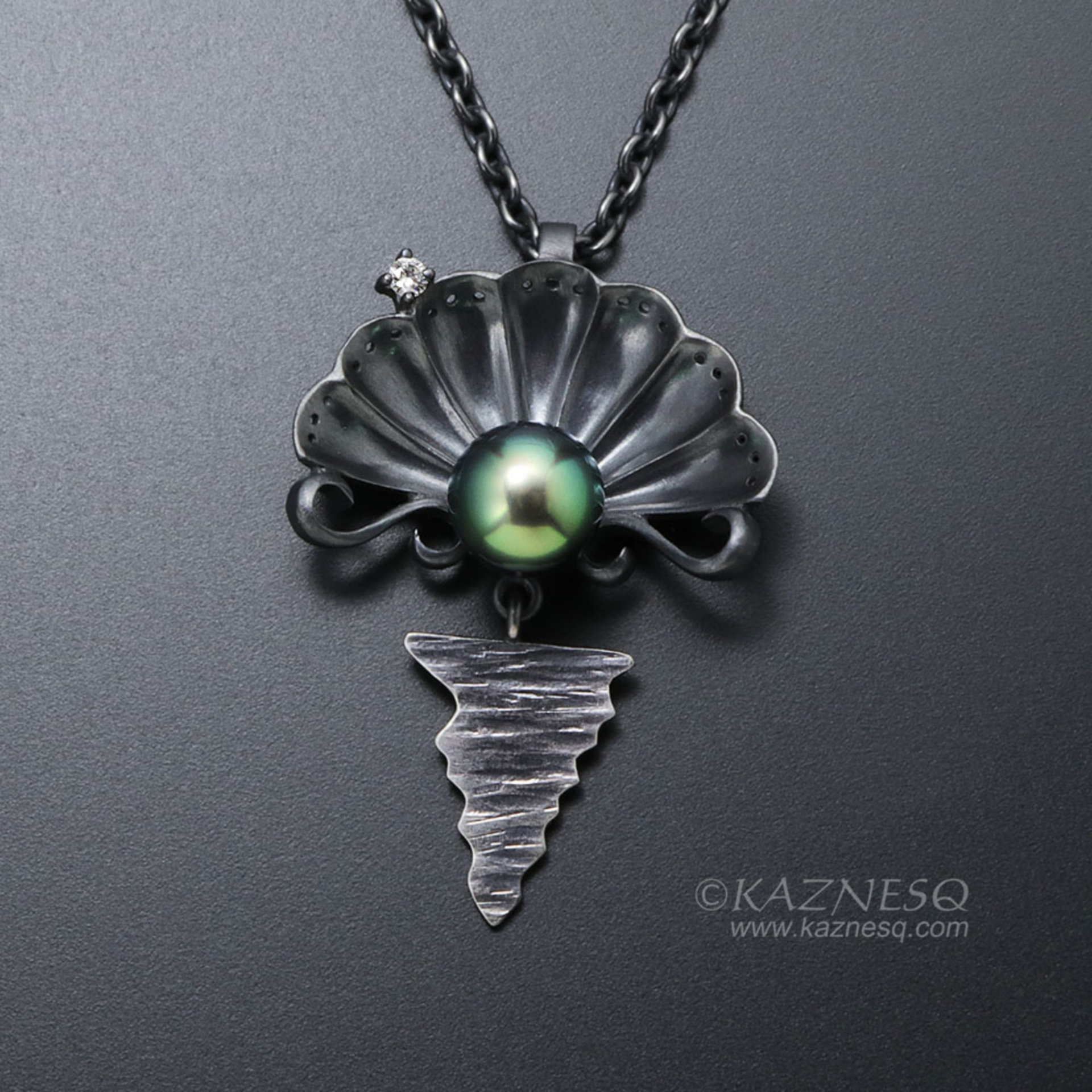 The moon on the ocean and Venus pendant, Black south sea pearl and a diamond oxi