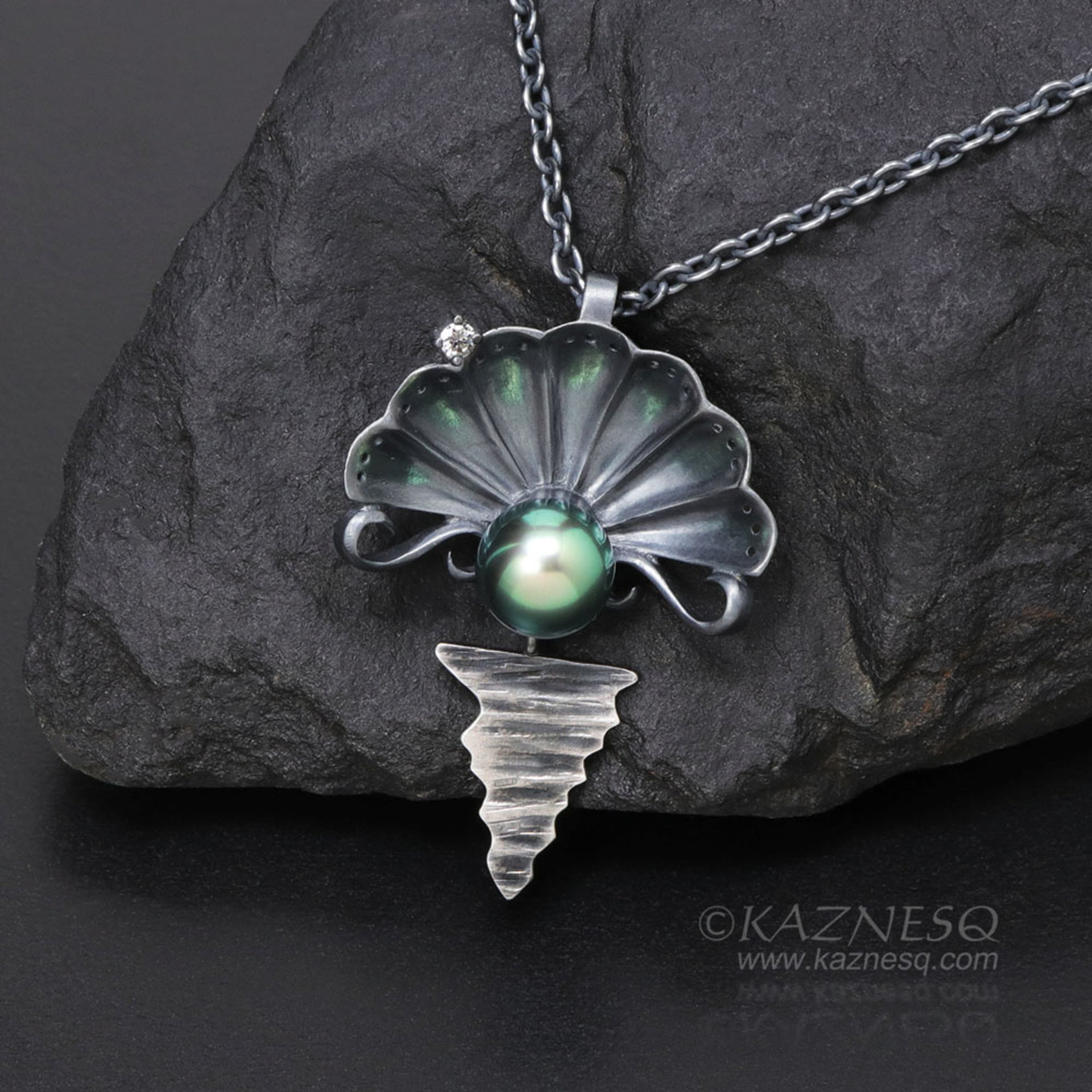 The moon on the ocean and Venus pendant, Black south sea pearl and a diamond oxi