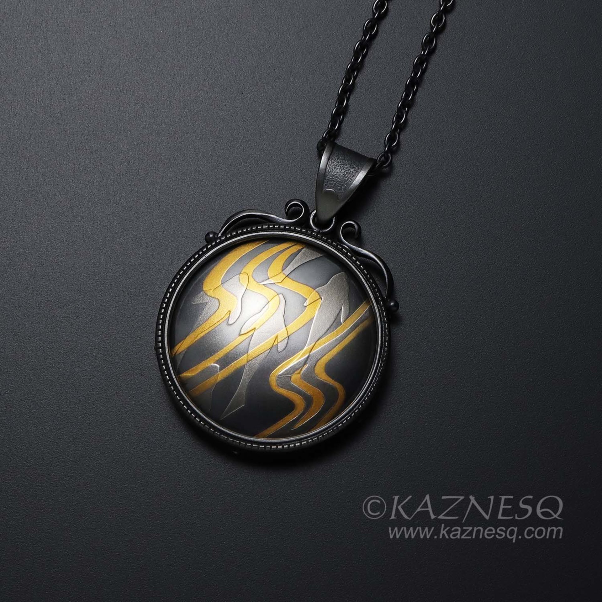 (C) KAZNESQ: Keum Boo oxidized silver round pendant of water pattern and fishes