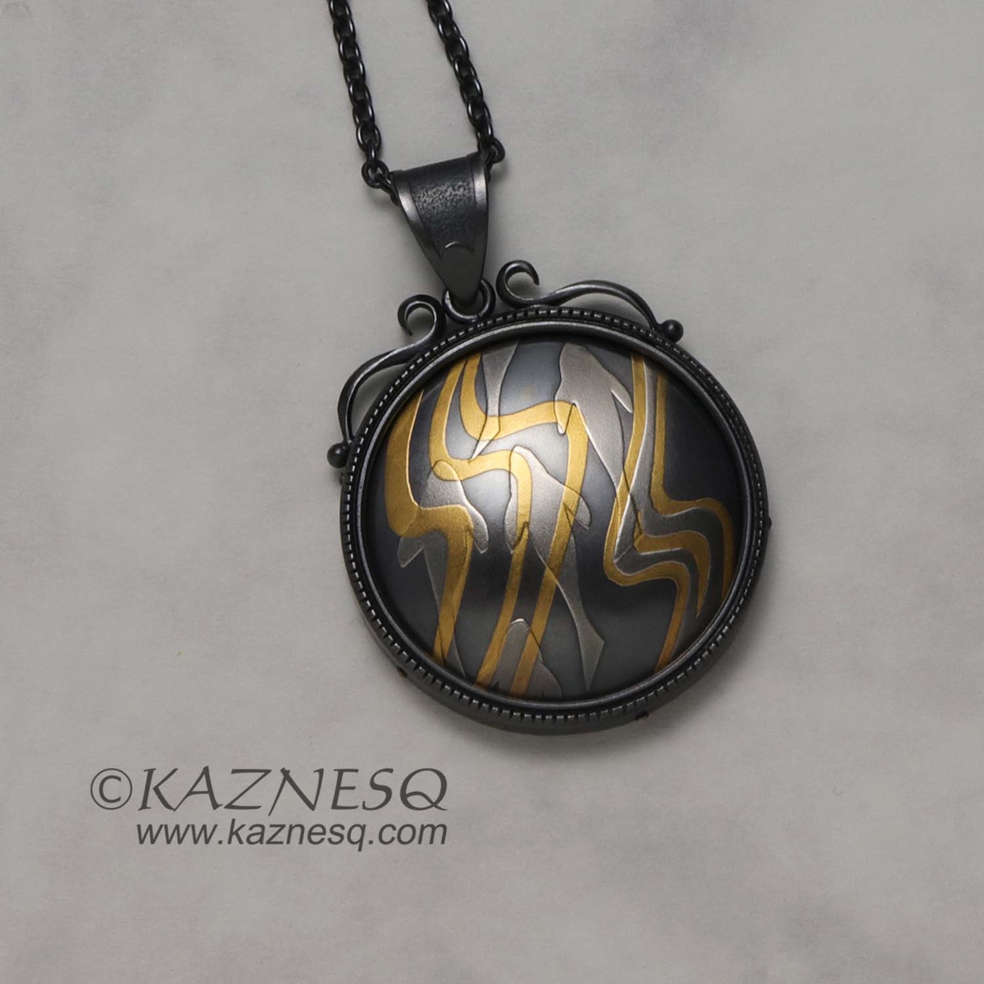 (C) KAZNESQ: Keum Boo oxidized silver round pendant of water pattern and fishes