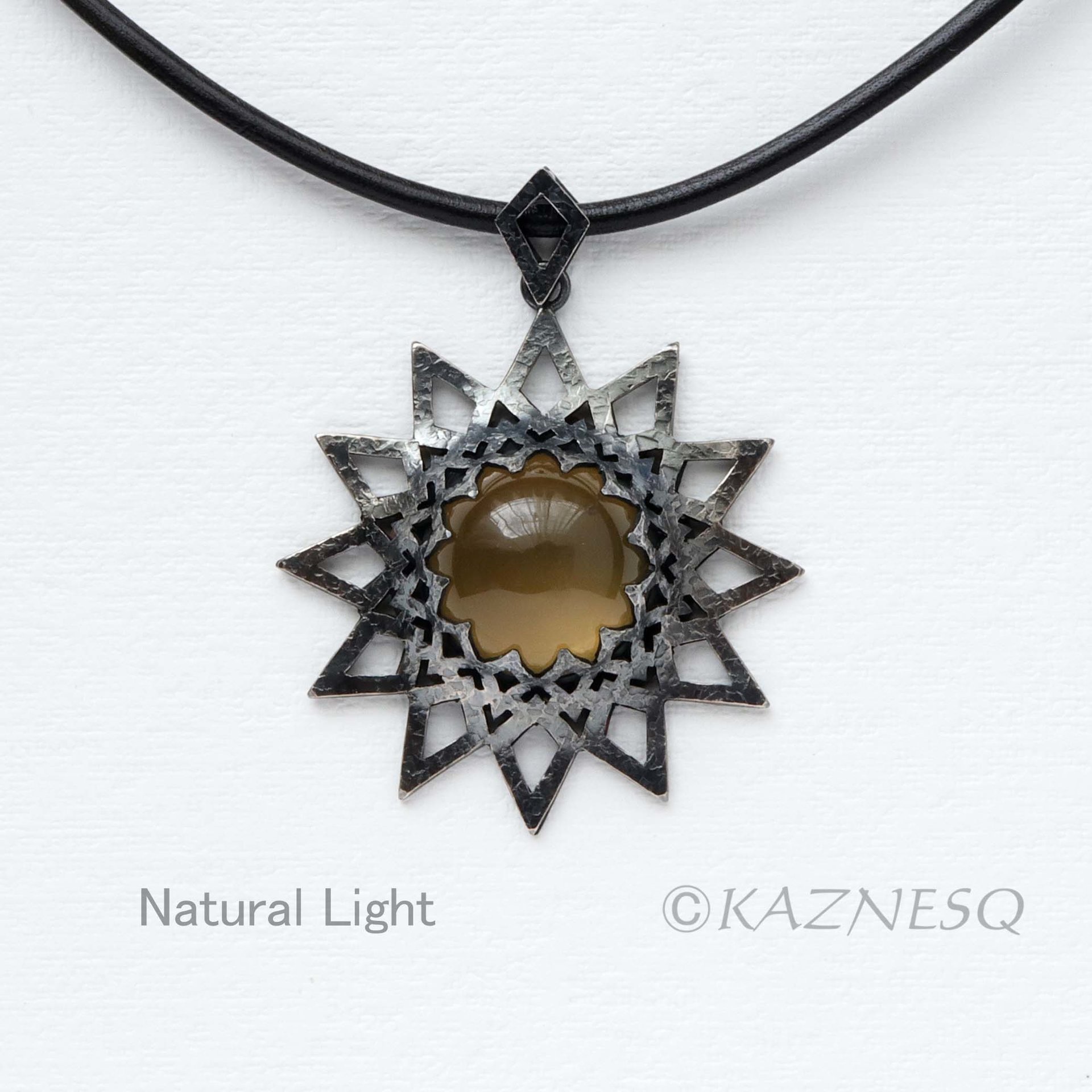 (C) KAZNESQ: Brown quartz oxidized silver star shape openwork goth pendant