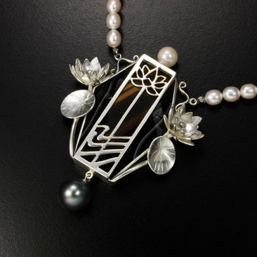 Lotus open work tiger's eye necklace