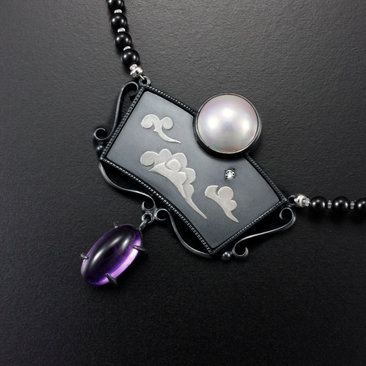SOLD: The moon and the morning star necklace with a mabe, a diamond, and amethysts.