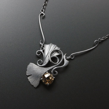 Gothic style Ginkgo necklace of oxidized silver and brown quartz